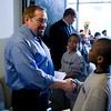 chgprovjesuits > Chicago Jesuit Academy Principal Dr. Kevin Zajdel greets fifth grader Christopher prior to the start of the first semester honors assembly.
